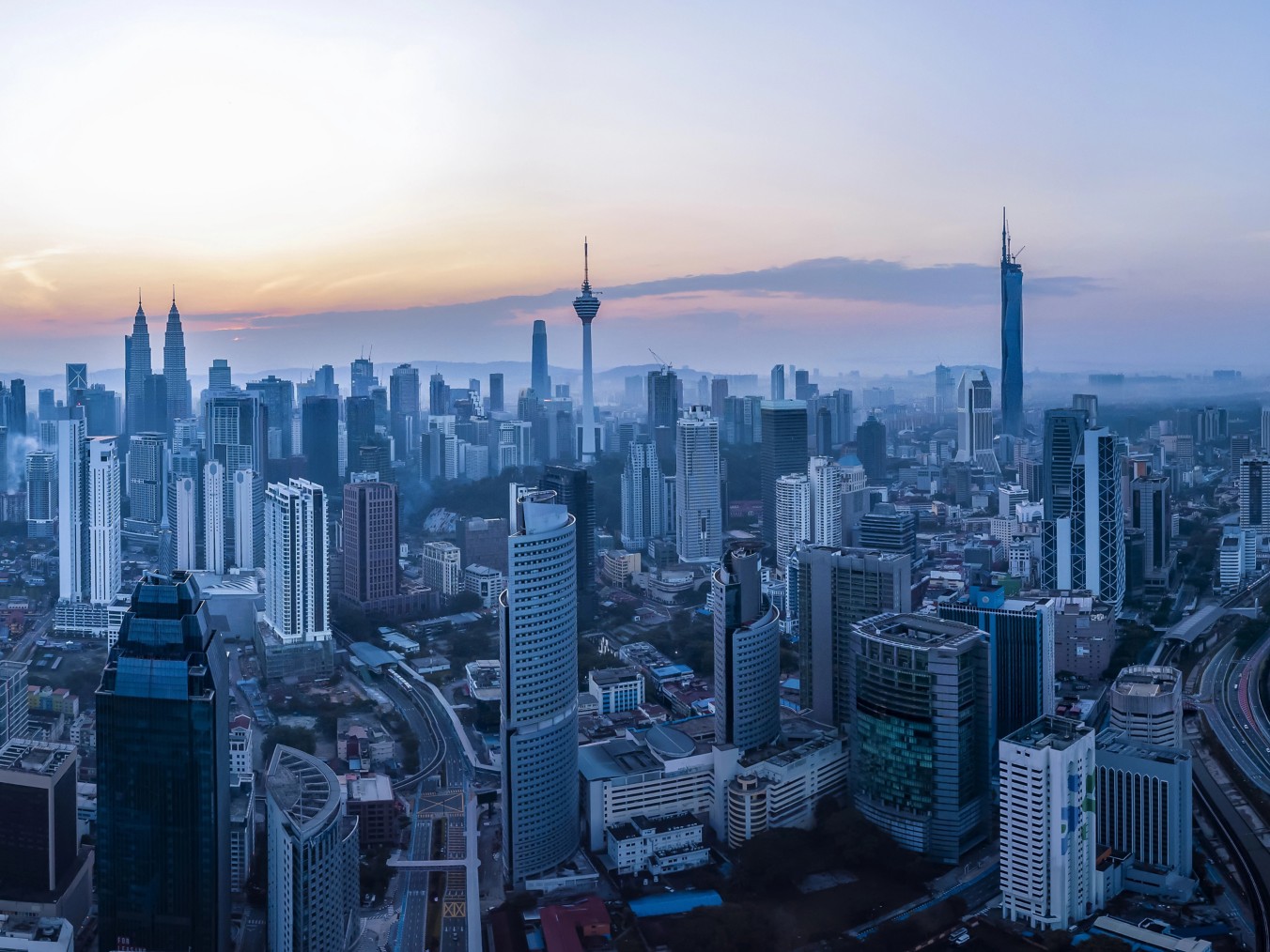 the city of Kuala Lumpur seen from a drone at sunset