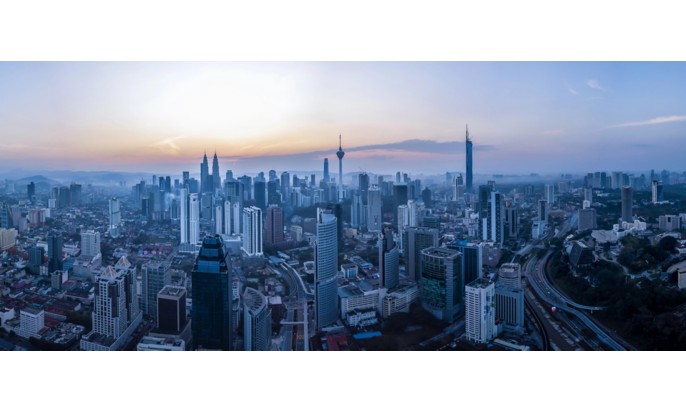 the city of Kuala Lumpur seen from a drone at sunset