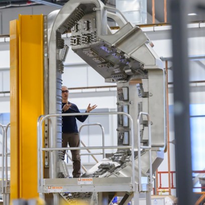 Magnetic fusion machinery with person presenting it