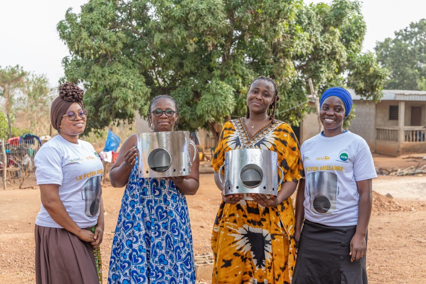 Women show off their improved stoves