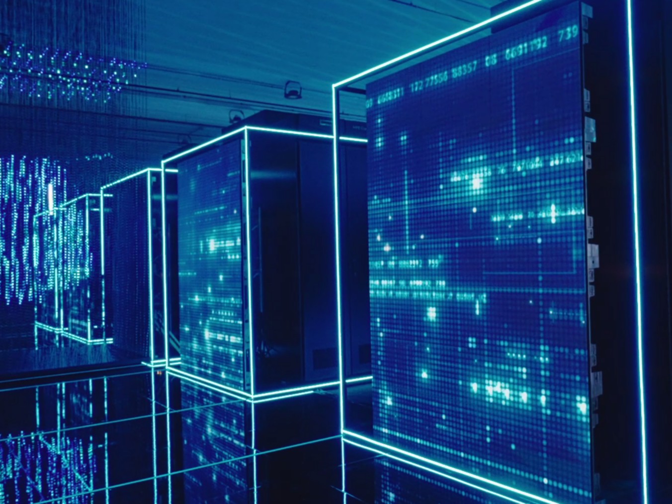 Eni HPC6 supercomputer with servers lit by blue lights.