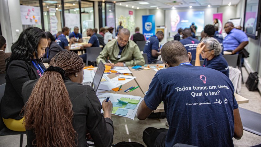 Group of people working around a table