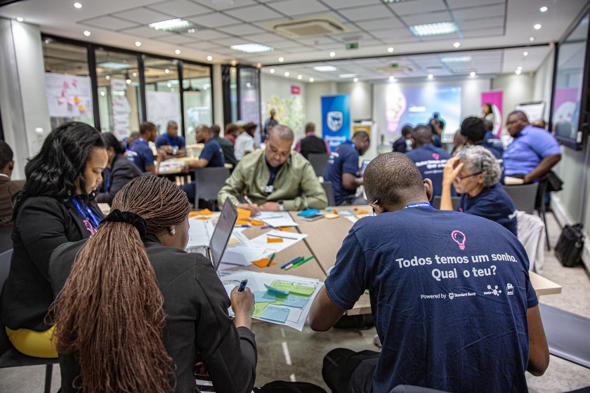 Group of people working around a table