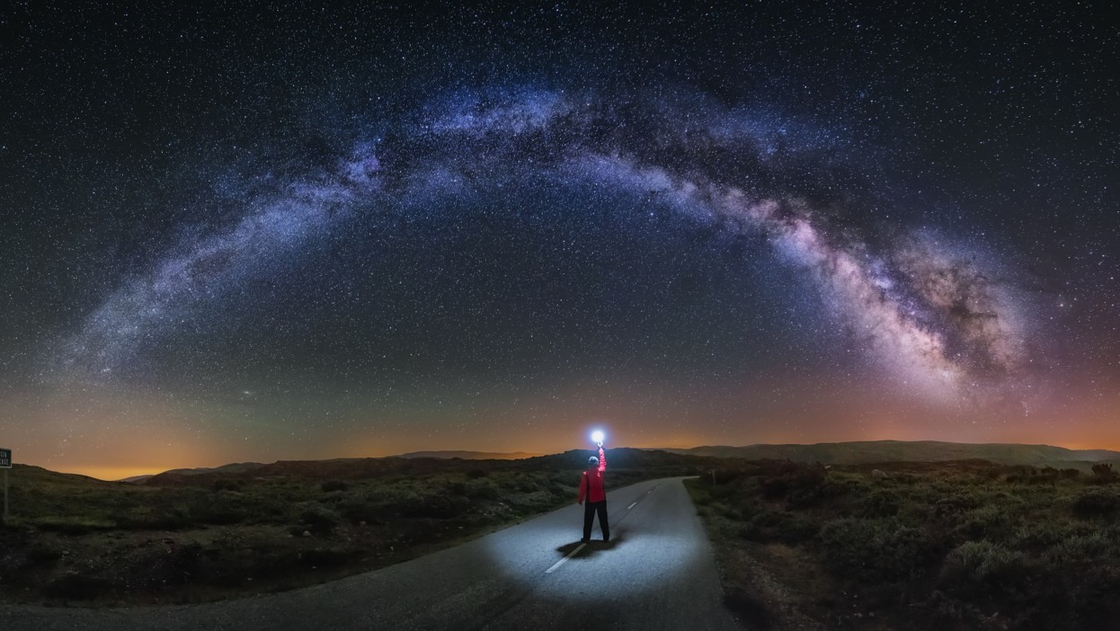 A person under starry sky