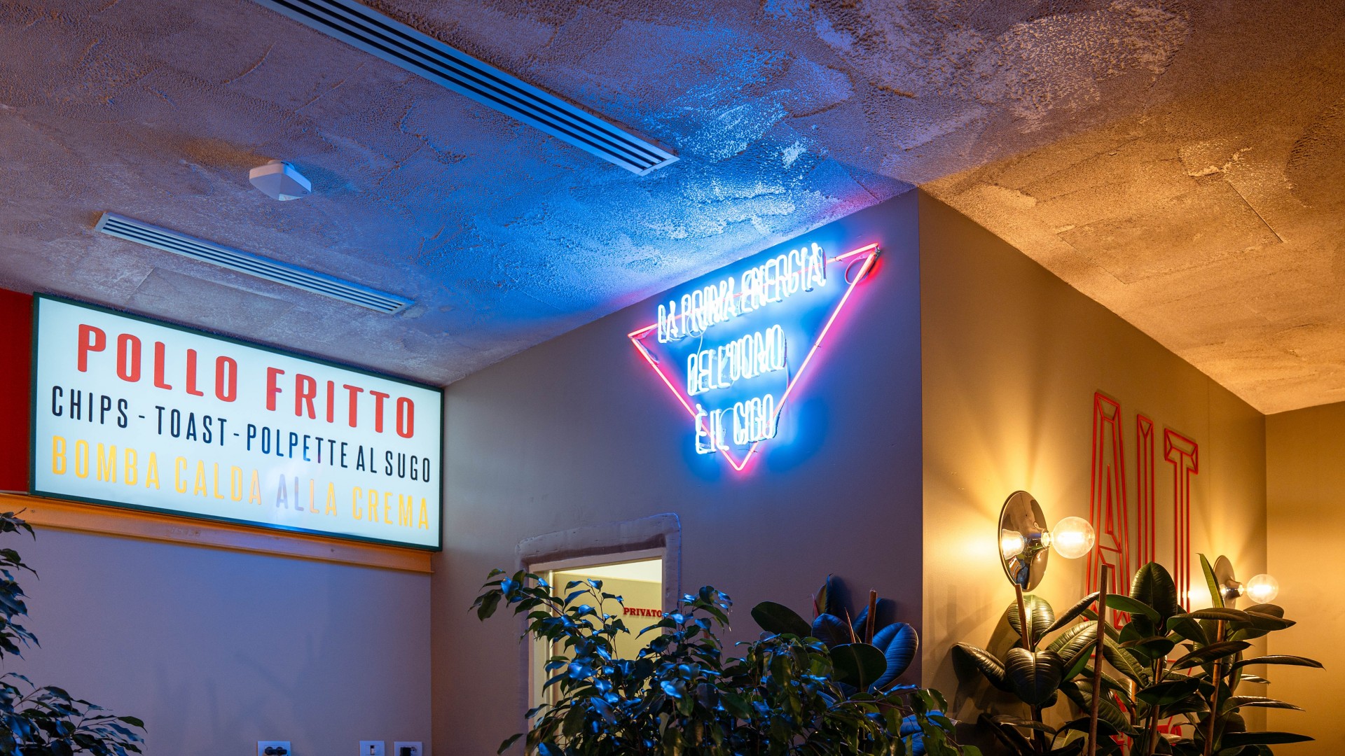 Signs inside the restaurant ALT Stazione del Gusto in Sesto San Giovanni, in the province of Milan.