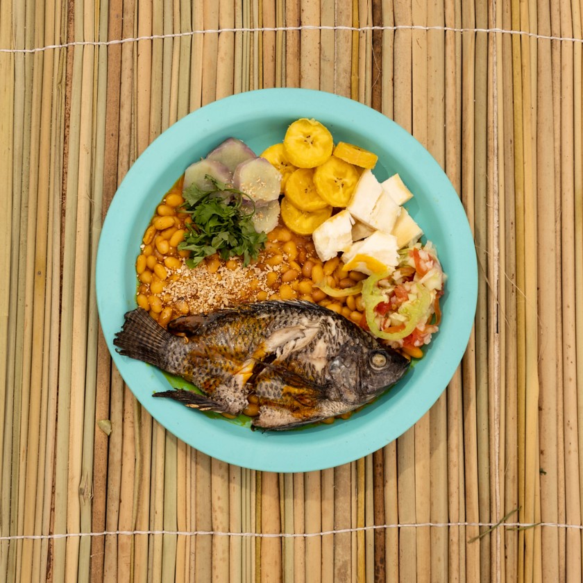 A traditional Angolan dish with fish, plantains, and legumes