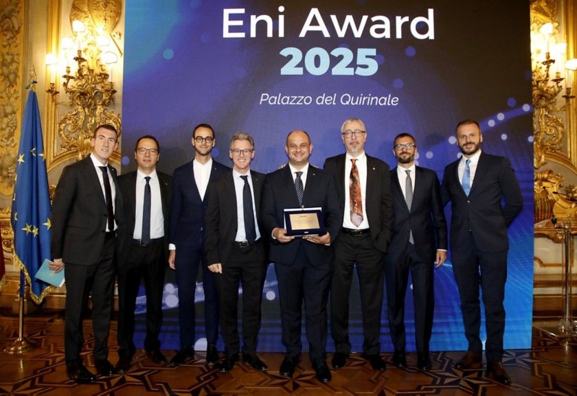 Simone Ambrosini, Michele Gerolin, Tiberio Grasso, Luigi Miozza, Alberto Moro, and Andrea Vignali, winners of the "Eni Innovation Recognition Prize," stand with the Eni Award plaque