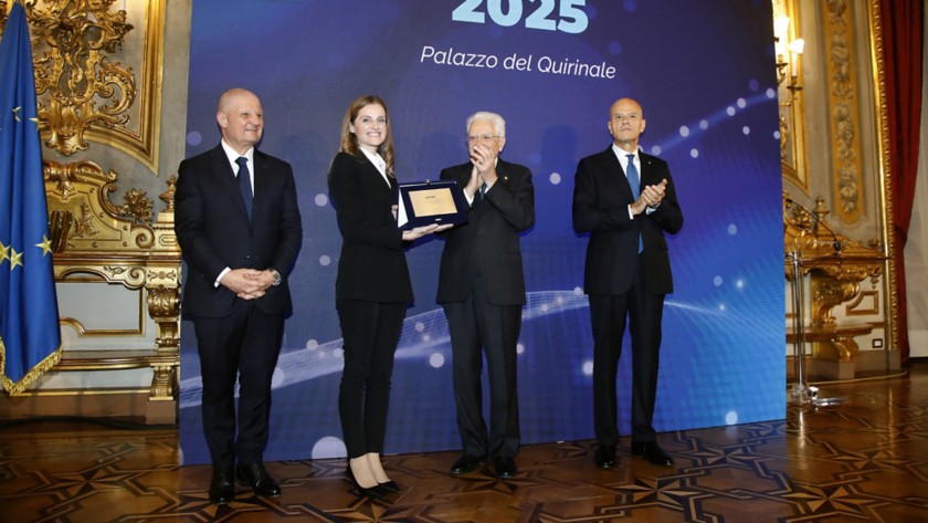Young Researcher of the Year Prize recipient Maria Basso (University of Padua) accepting her award