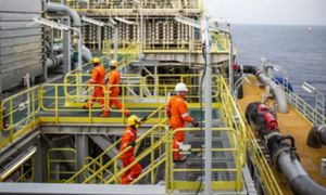 Ship processing gas with workers on board