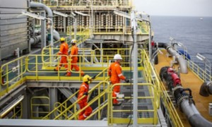 Ship processing gas with workers on board