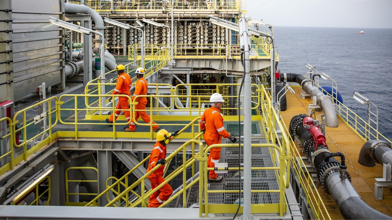 Ship processing gas with workers on board