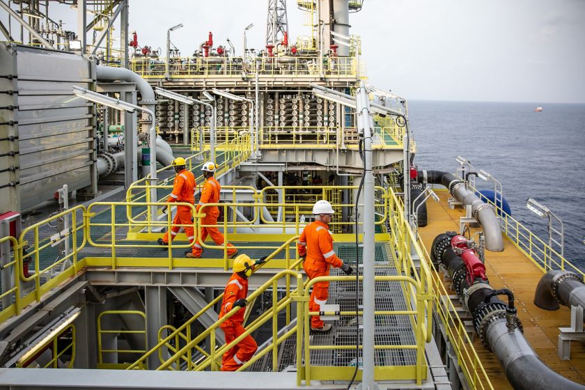 Ship processing gas with workers on board