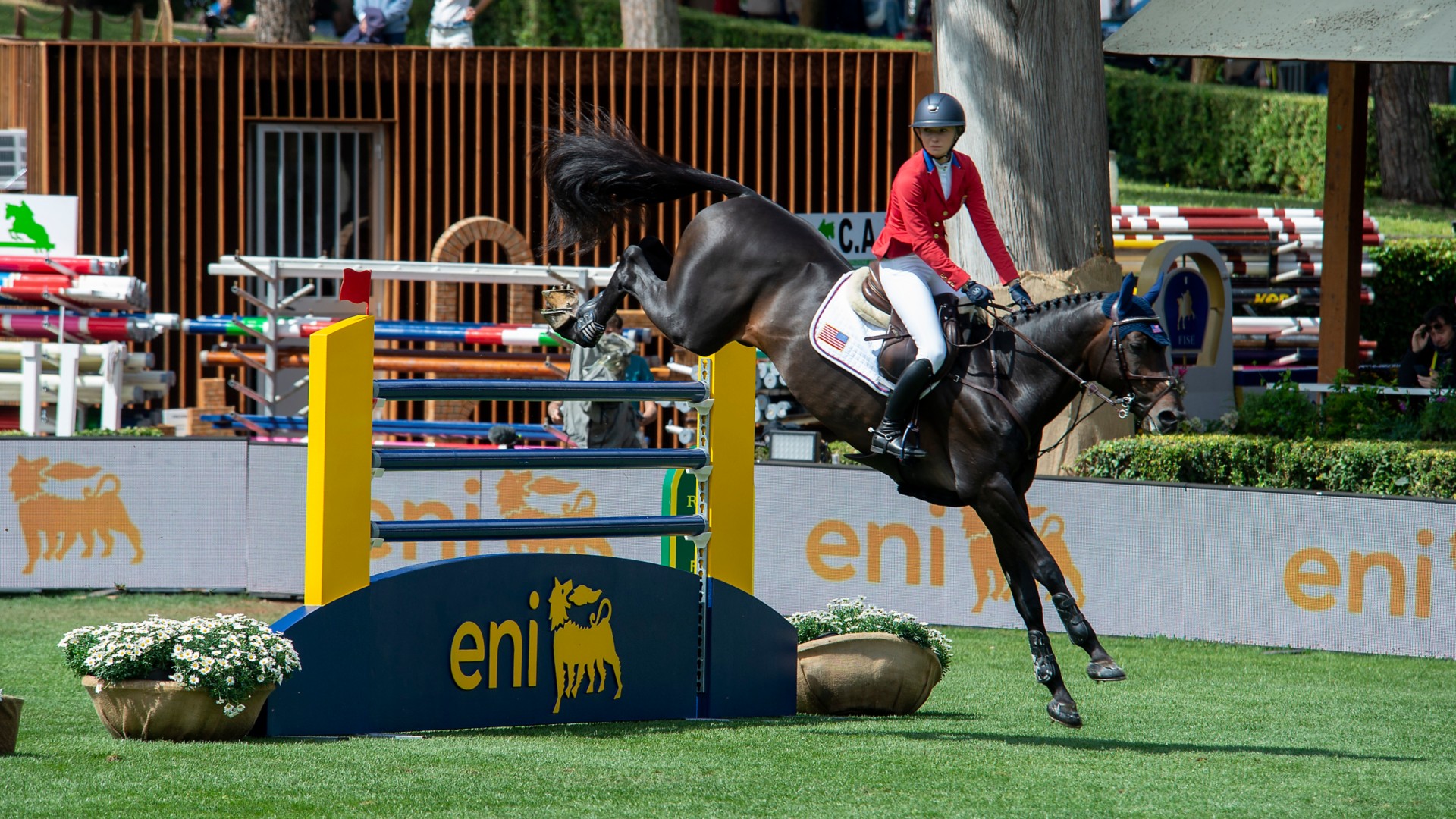 A jockey jumping an obstacle at the Piazza di Siena event