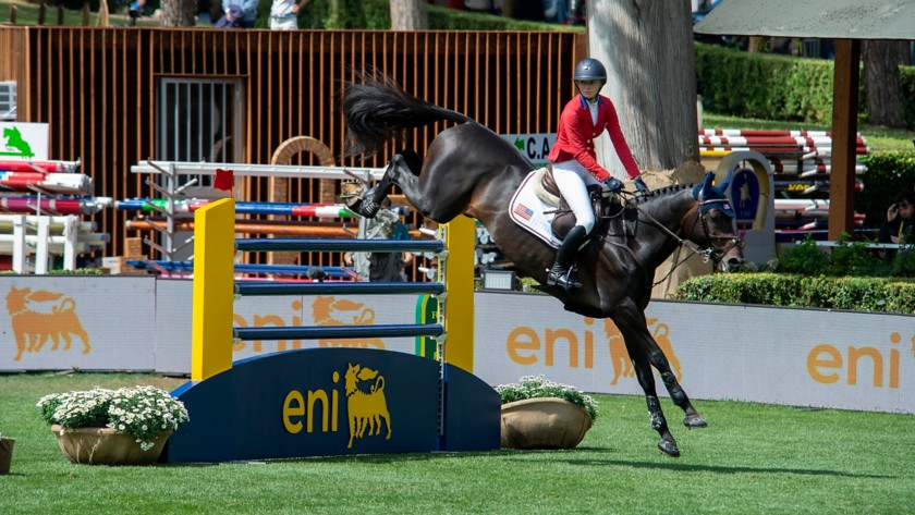 A jockey jumping an obstacle at the Piazza di Siena event