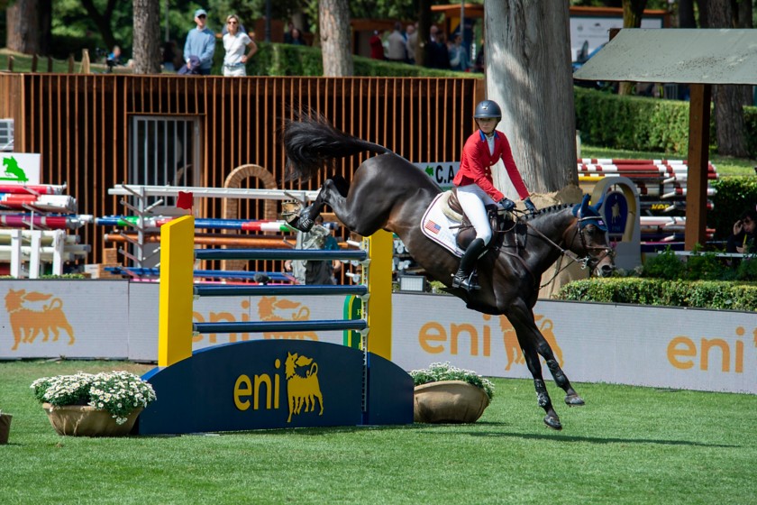 A jockey jumping an obstacle at the Piazza di Siena event