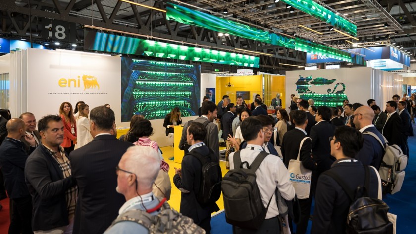 Visitors and sector operators standing at the company stand during the event