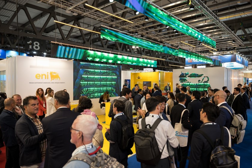 Visitors and sector operators standing at the company stand during the event