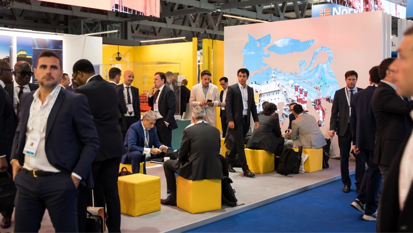 Visitors and sector operators standing at the company stand during the event