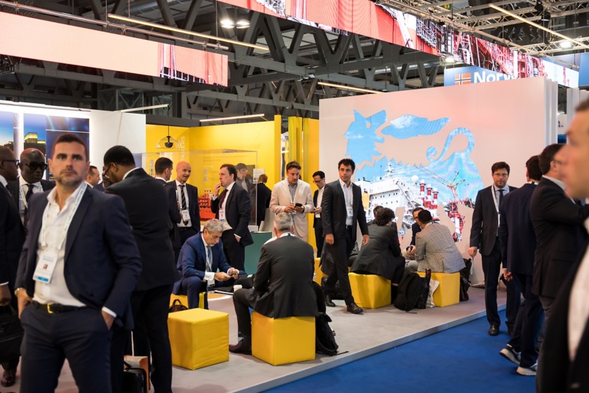 Visitors and sector operators standing at the company stand during the event