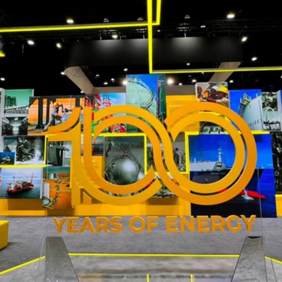 Stand di Eni a Gastech per i 100 anni della famiglia Eni