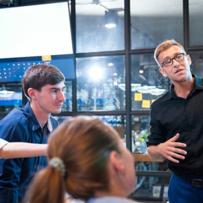 Young work team faces off in meeting