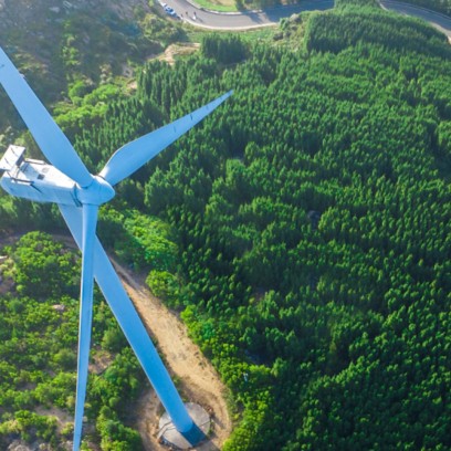 Wind turbines on green hills