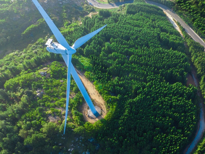 Wind turbines on green hills