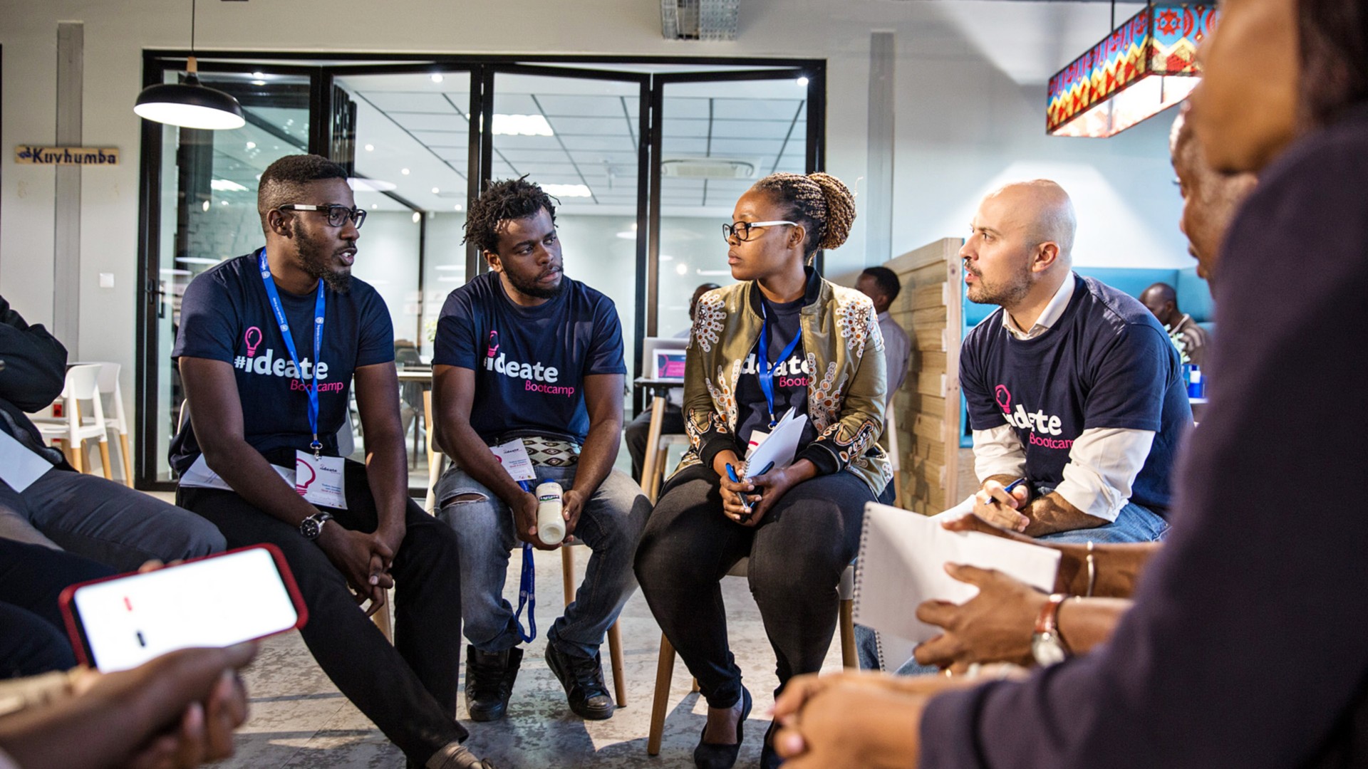 Group of people sitting and chatting