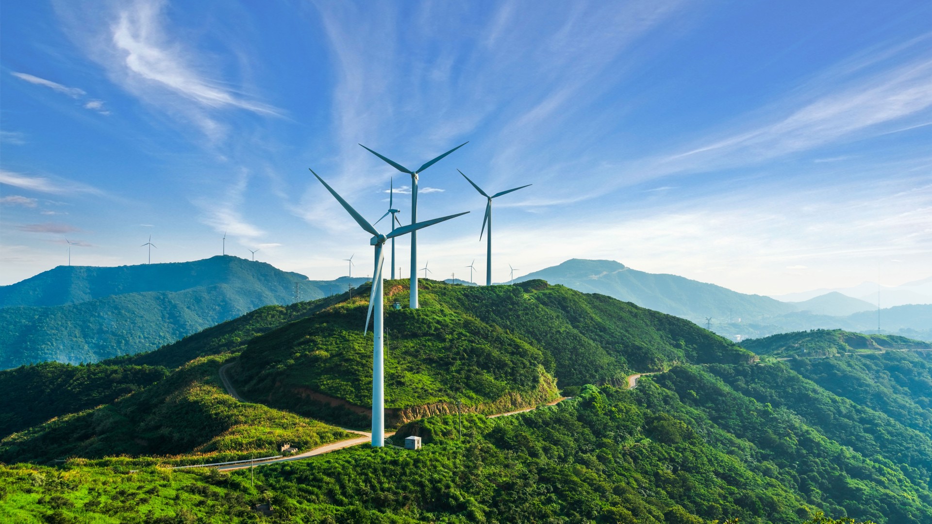 Wind turbines on green hills