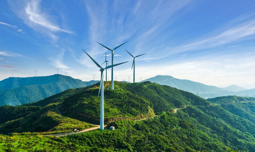 Wind turbines on green hills