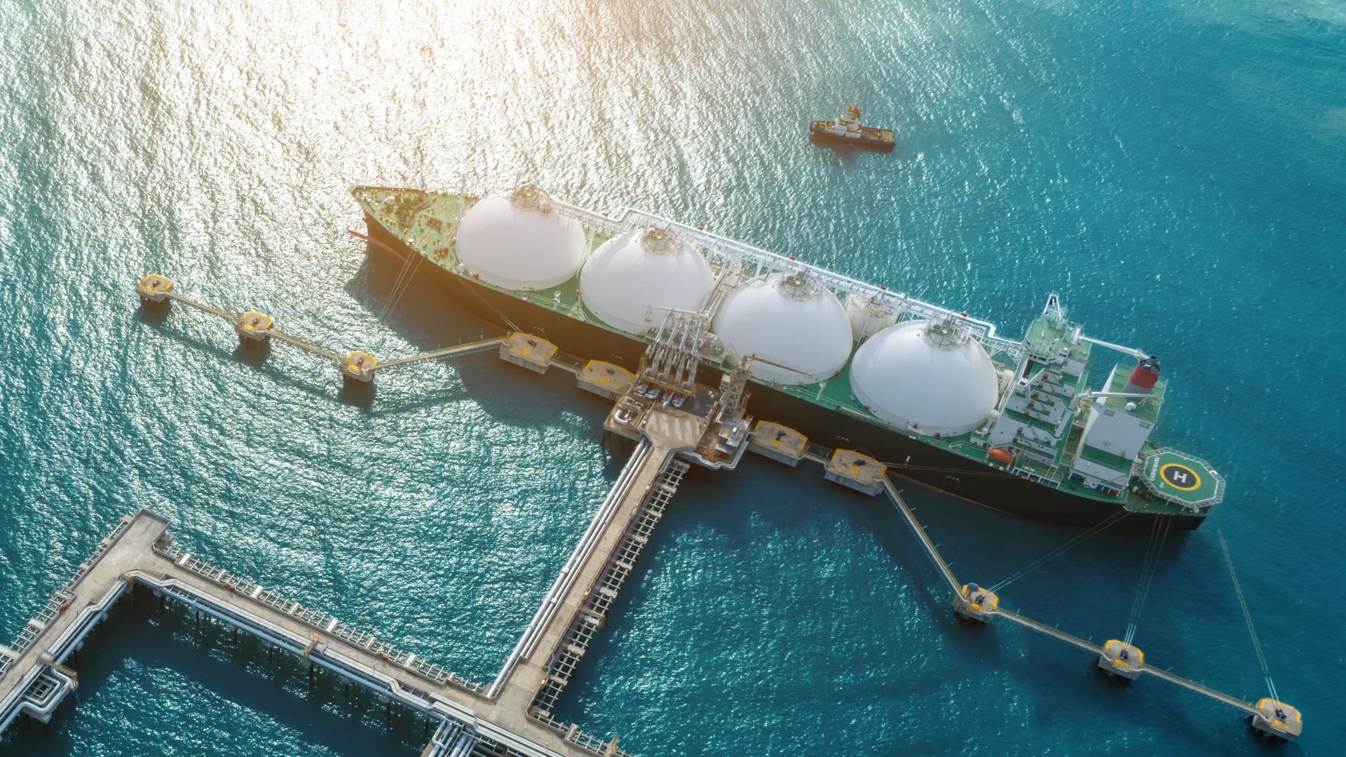 LNG (Liquified Natural Gas) tanker anchored in Gas terminal gas tanks for storage