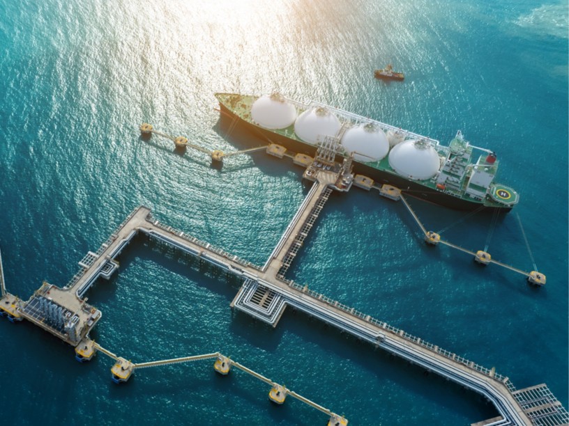 LNG (Liquified Natural Gas) tanker anchored in Gas terminal gas tanks for storage