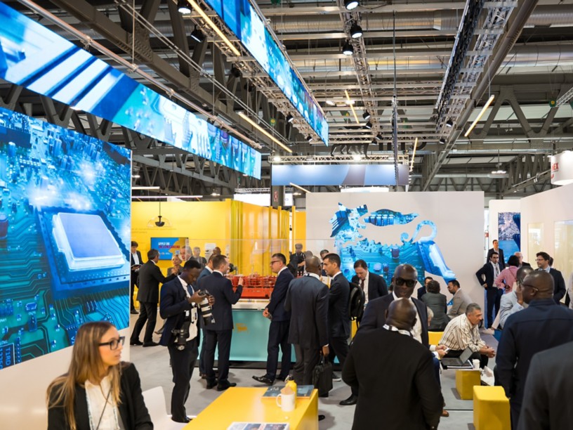 Visitors and sector operators at the Eni exhibition space