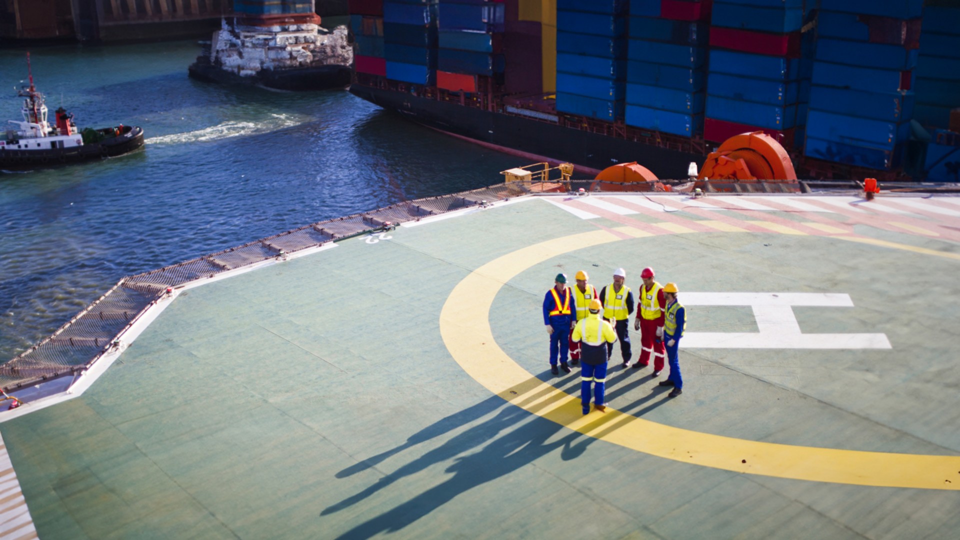 Workers on board the ship