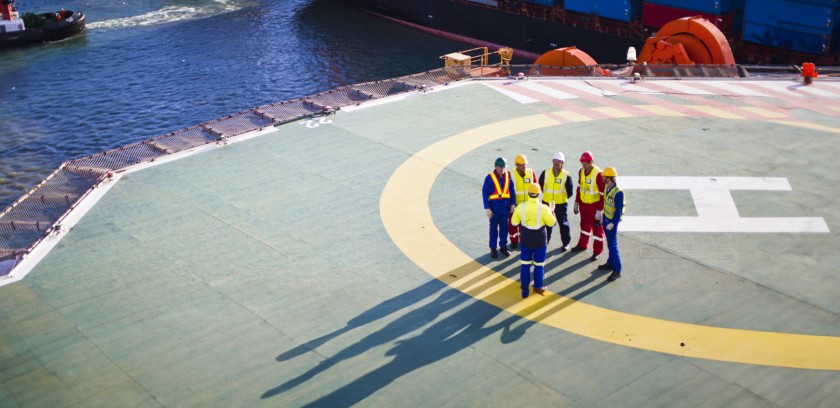 Workers on board the ship
