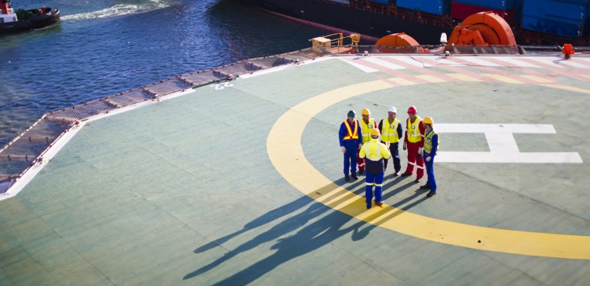 Workers on board the ship