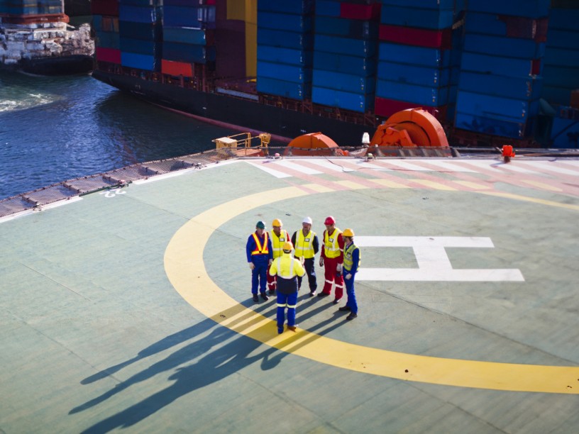 Workers on board the ship