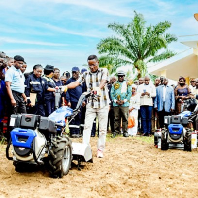 motorized plow operation demonstration in front of the community