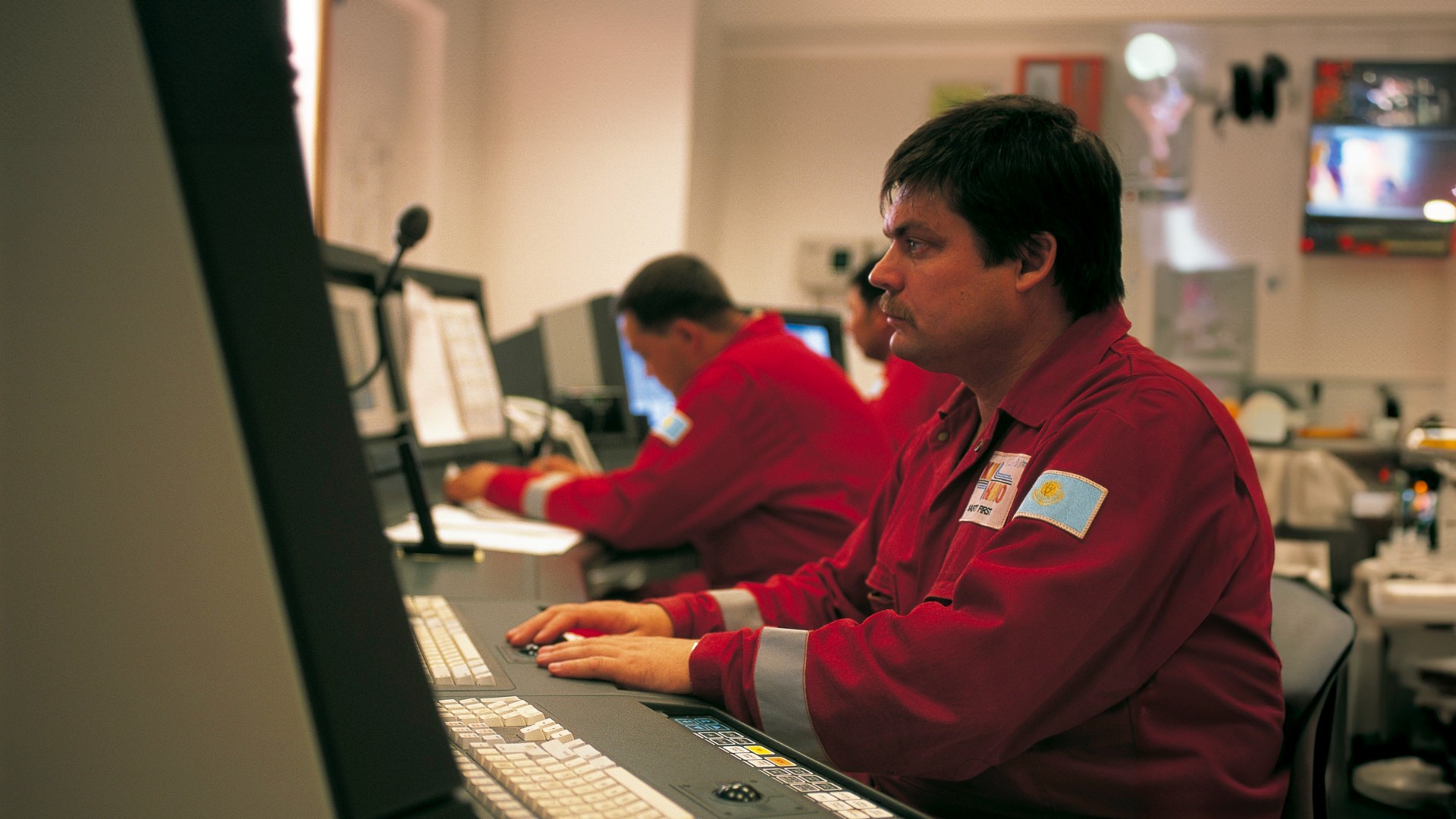 technicians in the control room