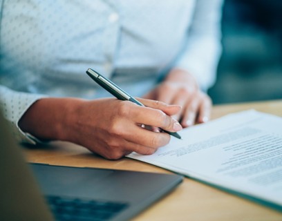 Hand with documents