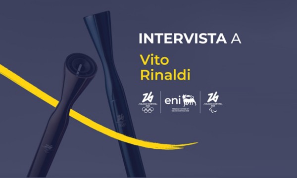 Grafica promozionale con torce stilizzate e testo "Intervista a Vito Rinaldi", loghi Milano Cortina 2026, Eni e simboli olimpici.