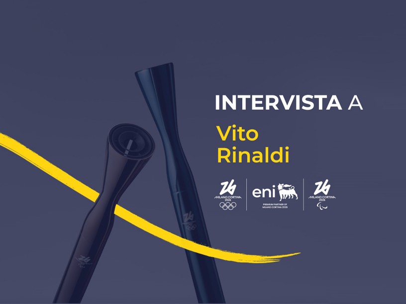 Grafica promozionale con torce stilizzate e testo "Intervista a Vito Rinaldi", loghi Milano Cortina 2026, Eni e simboli olimpici.