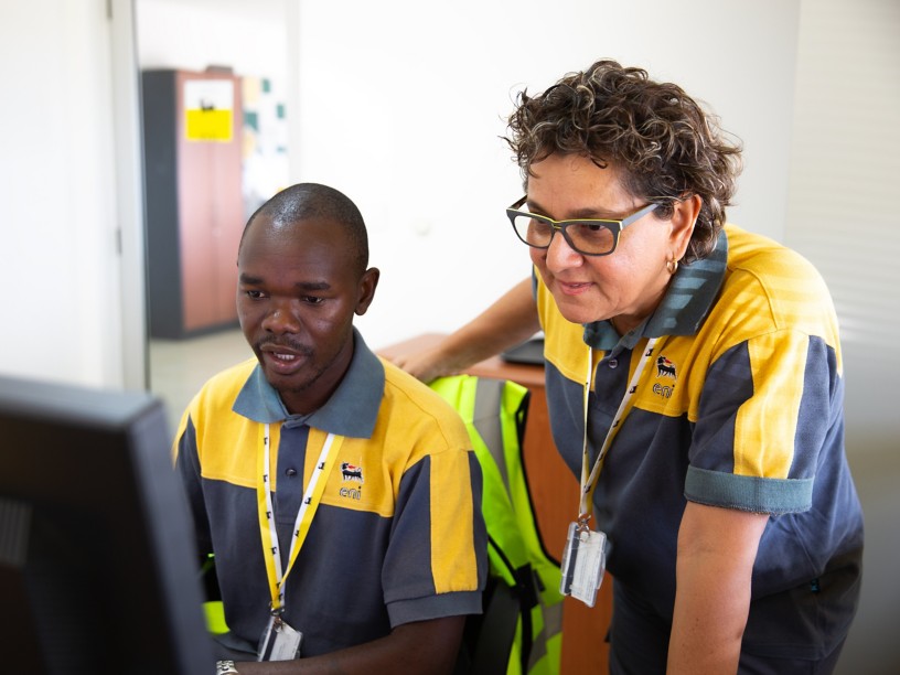 Team working in front of computer