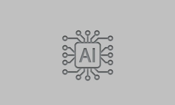 Icon of a chip with AI text on a light gray background.