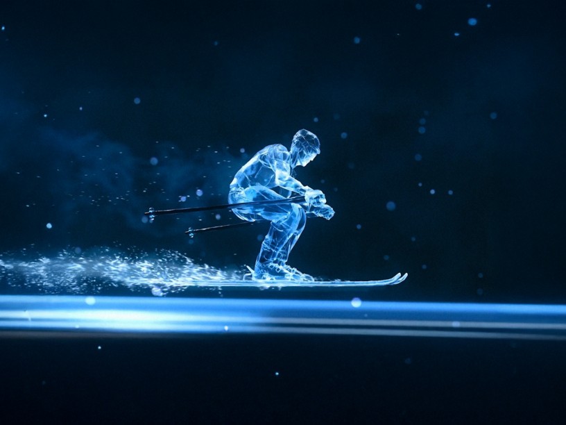 Sciatore stilizzato in materiale blu traslucido, in posizione dinamica su una superficie luminosa con particelle, che trasmette velocità e movimento in un contesto digitale e futuristico.