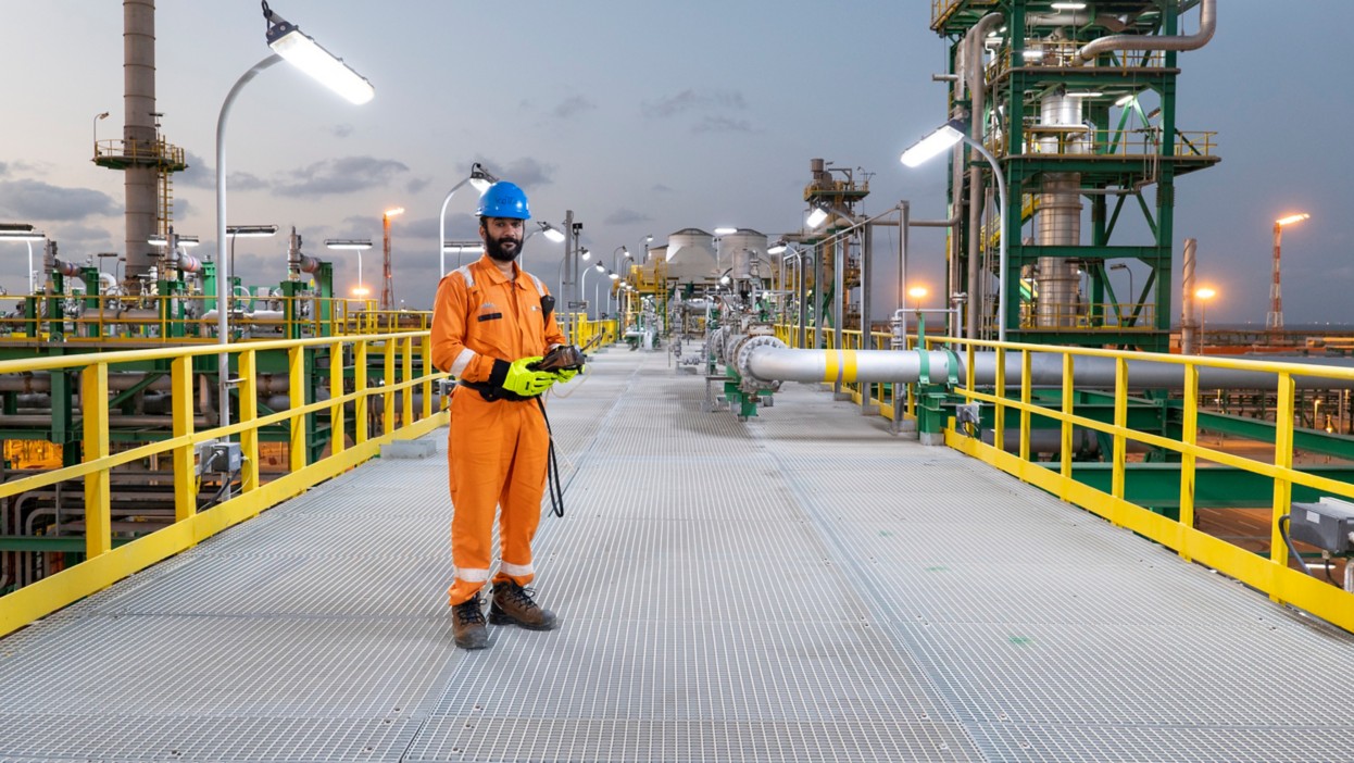 Egyptian worker walking through the plant.