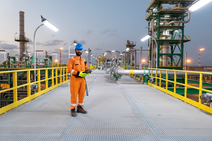 Egyptian worker walking through the plant.