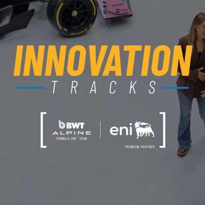 BWT Alpine Formula 1 car on display with blue-pink livery, visible sponsors, and “INNOVATION TRACKS”