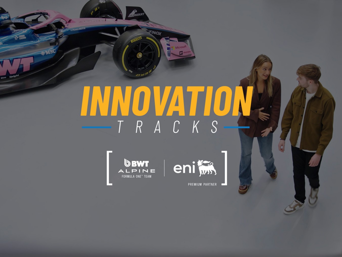 BWT Alpine Formula 1 car on display with blue-pink livery, visible sponsors, and “INNOVATION TRACKS”