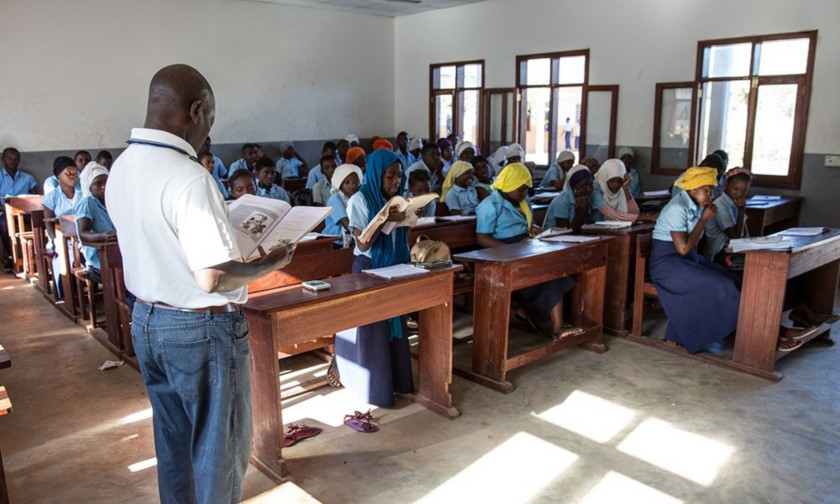 African children teaching in classroom